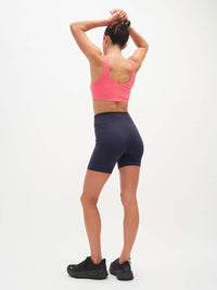 Back view of Echo 5.5" Short in Cotton Candy, featuring a tall waistband for secure hold.