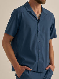Model wearing SolarCool Camp Collar in Deep Blue with a relaxed fit, ideal for enjoying sunny days outdoors.