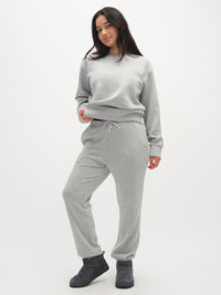 Model wearing Stratus Sweatshirt in Grey, featuring an ultra-soft feel for cozy comfort.