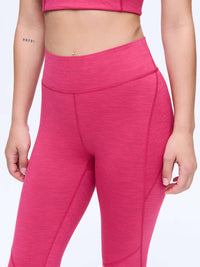 Close-up of model wearing TechSweat Core 7/8 Legging in Pink, featuring a high waistband that stays put.