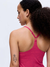 Back view of TechSweat Move Free Tank in Pink, with adjustable racerback straps and built-in shelf bra.