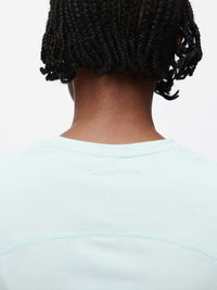 Back view of ThinkFast Jersey Baby Tee in Light Blue, highlighting the breathable fabric and relaxed fit.