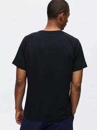 Back view of ThinkFast Mesh Shortsleeve in Black, with the classic fit and cooling technology.