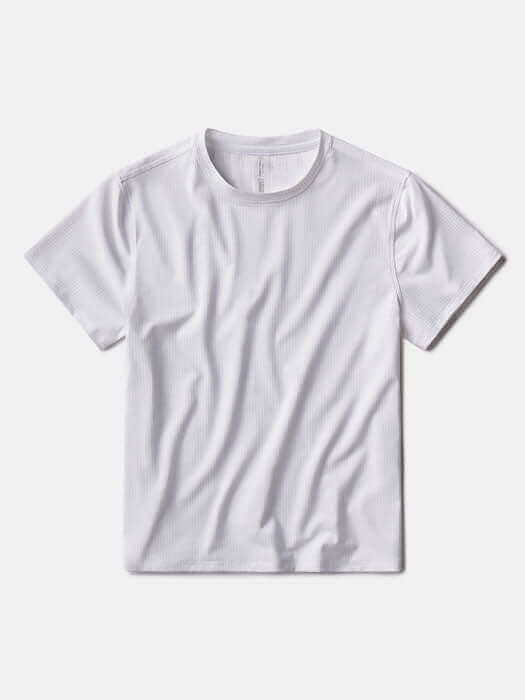Flat lay of ThinkFast Mesh Shortsleeve in White, featuring breathable fabric for moisture management.