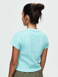 Back view of Waffle Baby Tee in Light Blue, with the fitted design and waffle knit texture.