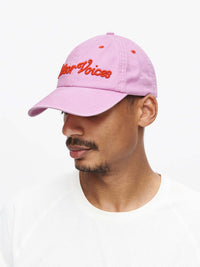 Model wearing Washed Hat in Lavender, featuring outdoor voices signature topstitching.