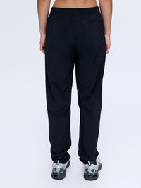 Back view of Zephyr 29" Pant in Black, with the lightweight and breathable fit for everyday wear.